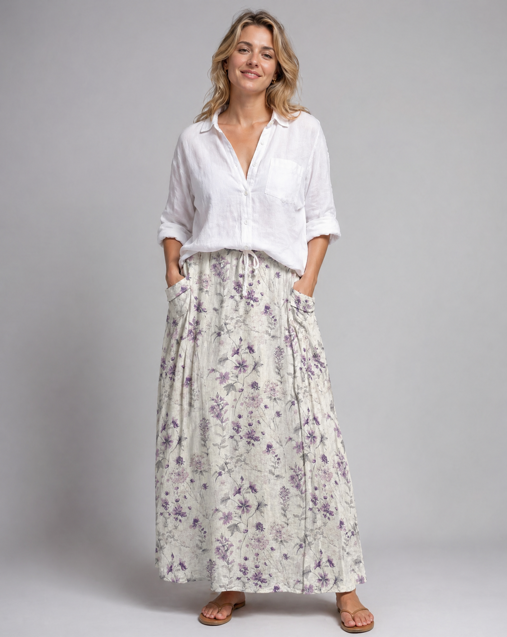 Floral print A-line pocket skirt with gathered waistband, light base and purple flowers