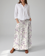 Floral print A-line pocket skirt with gathered waistband, long tiered look and purple flowers