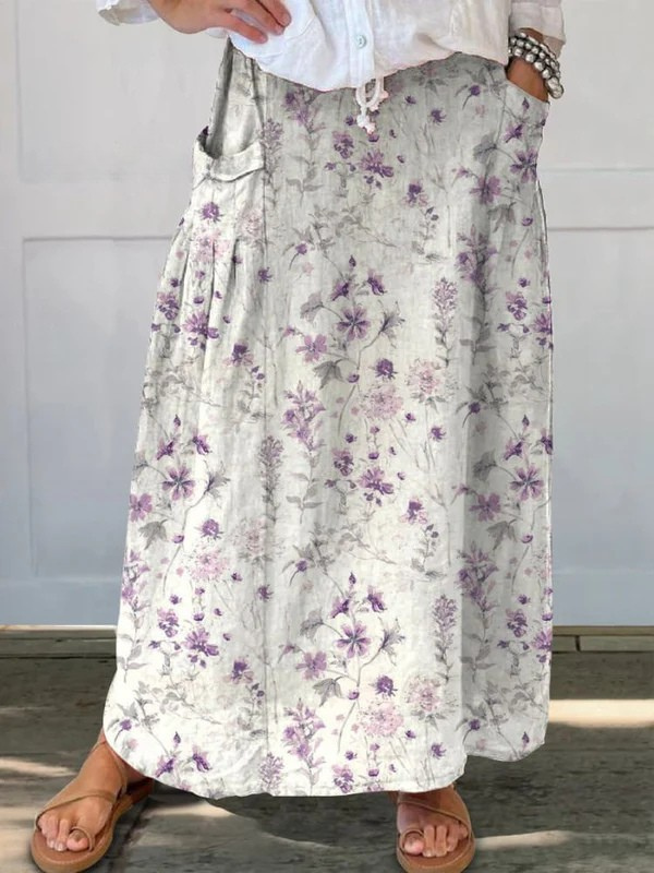 Floral print A-line skirt with side pockets, gathered waist, purple blossoms on light ground