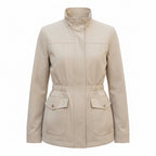 Women’s beige zip-front utility jacket with stand collar, patch pockets, and drawstring hem