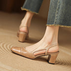 Beige leather heeled mule sandal with open back and block heel