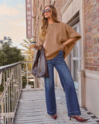 Taupe oversized knit pullover sweater with crew neckline and wide sleeves