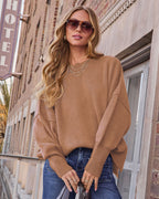 Taupe knit pullover sweater with crew neckline and long sleeves
