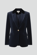 Navy women’s blazer with notched lapels, gold button closure, and flap pockets
