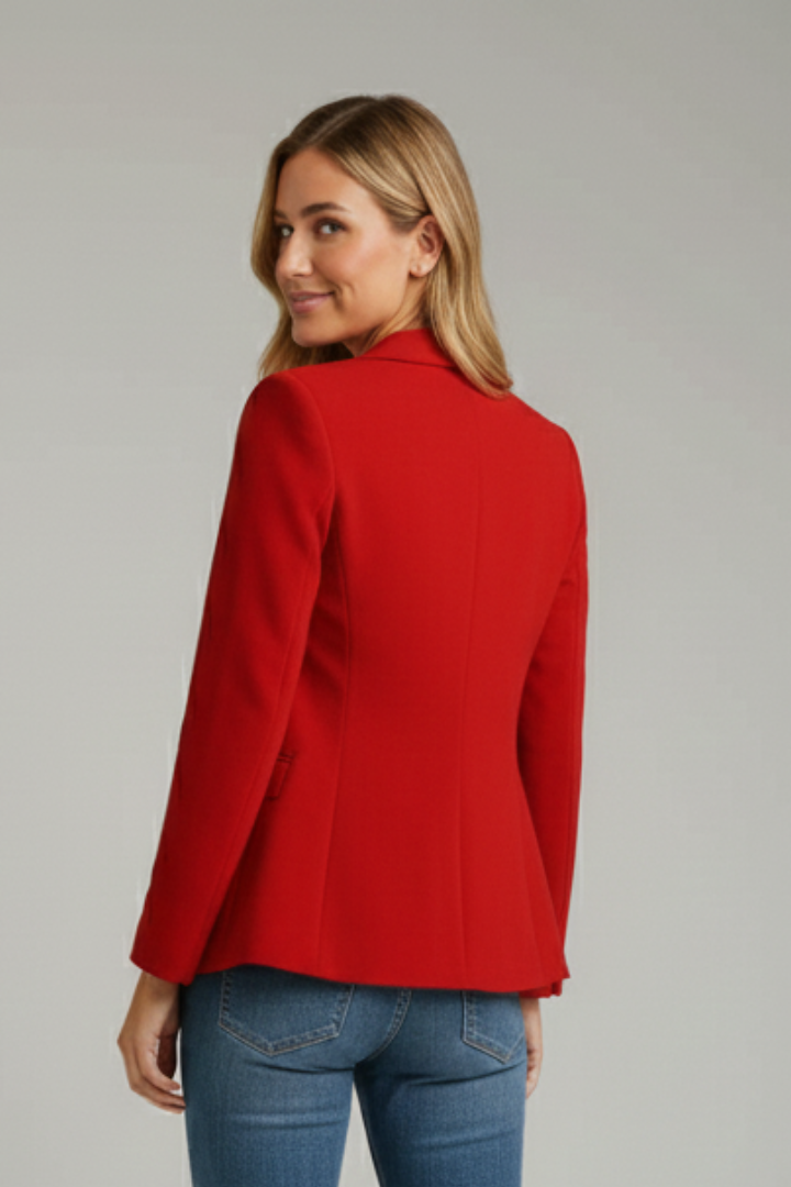 Red women's blazer back view with notched lapel and single-button design, long sleeves.