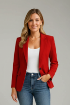 Red blazer worn open over a tank with notched lapel and single-button front.