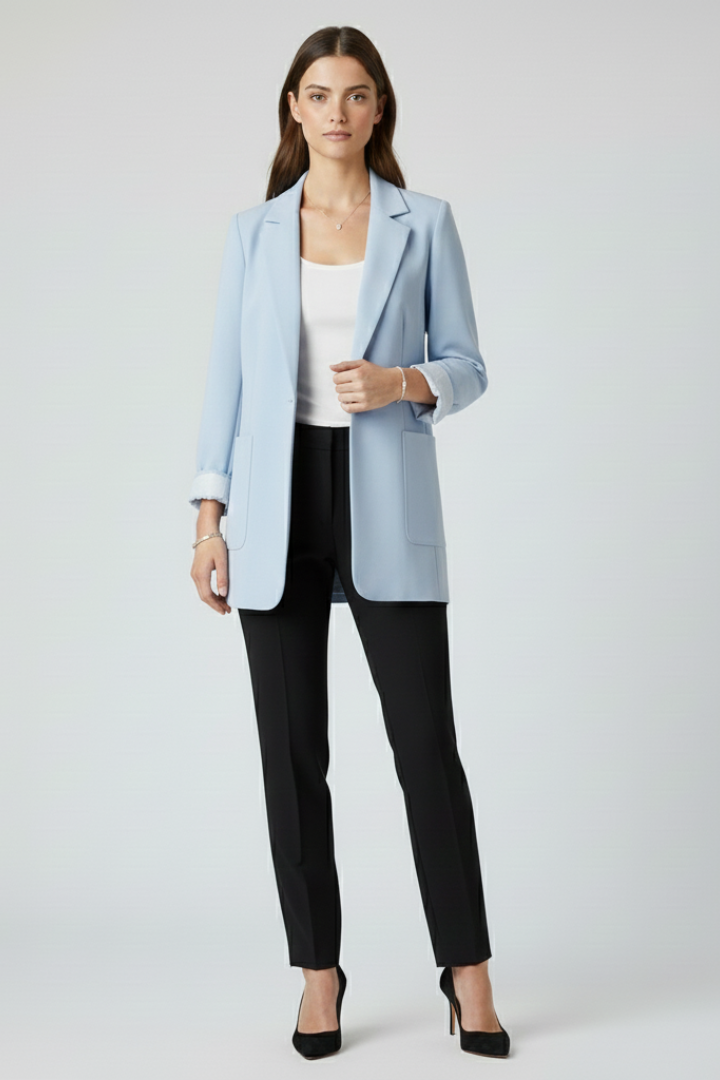 Women's light blue blazer with open front and structured lapels, cuffed sleeves