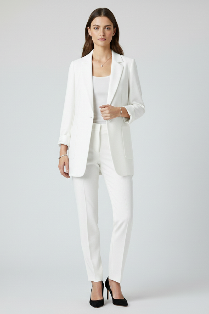 Women's white blazer with open front and structured lapels, long sleeves