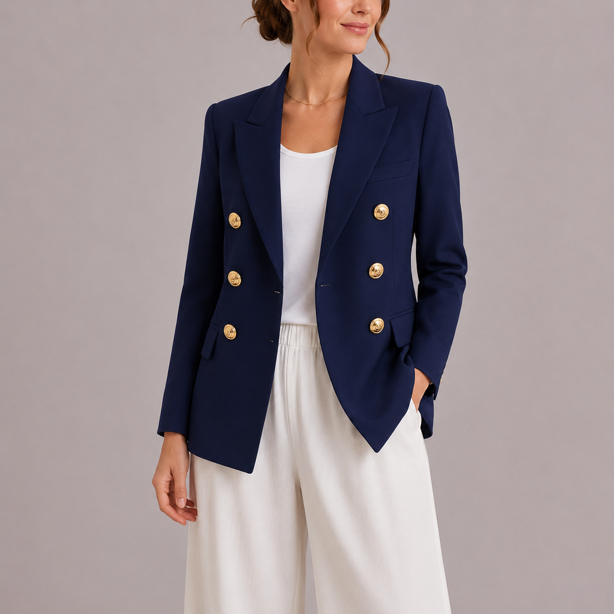 Navy double-breasted blazer with gold-tone buttons, notched lapels and tailored fit