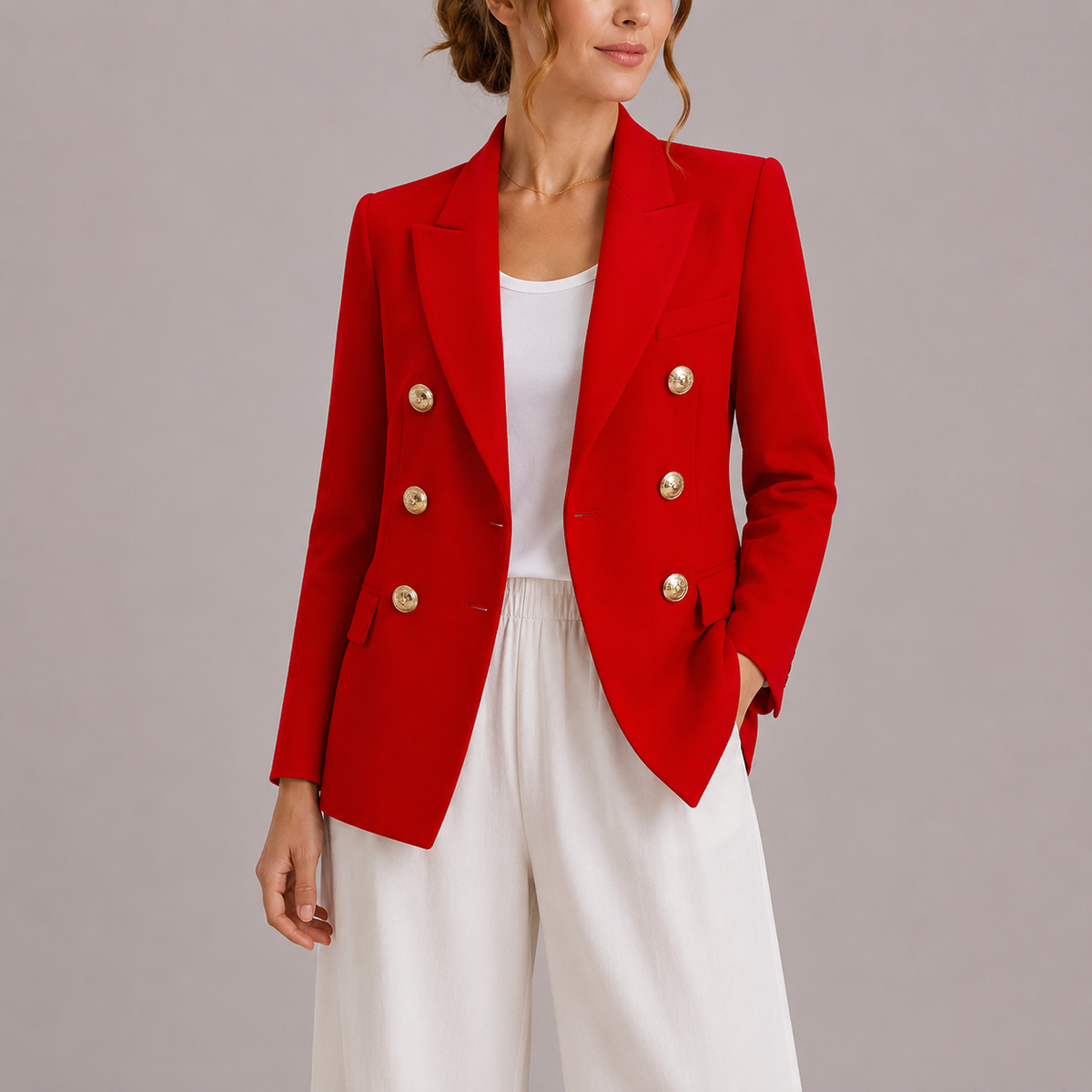 Red double-breasted blazer with gold-tone buttons, notched lapels and tailored fit