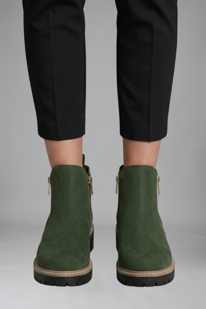 Women’s orthopaedic ankle boots in dark green suede with side zip closure and tread sole