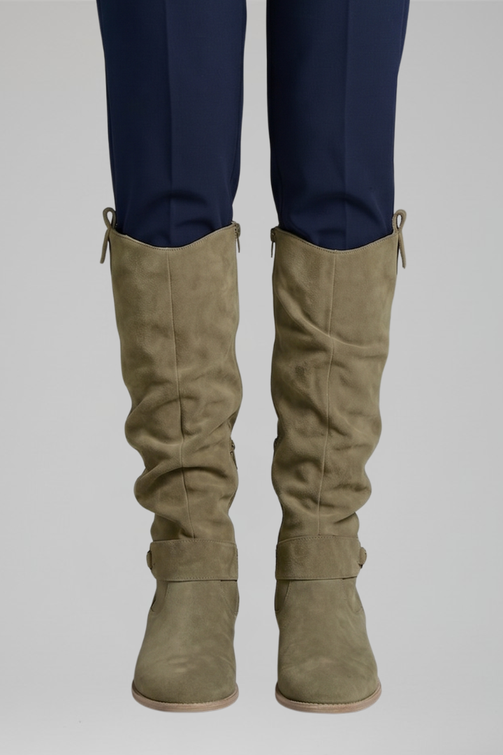 Dark green knee-high boots with side zipper and adjustable ankle strap, low heel.