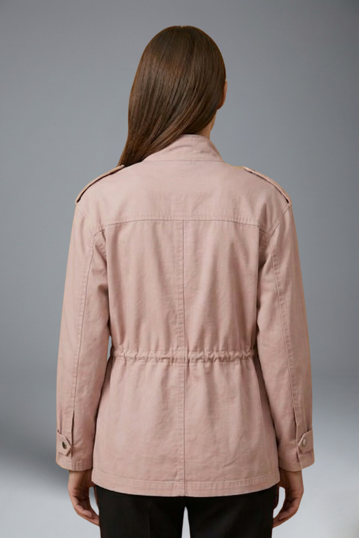 Women’s utility jacket in light pink, back view with gathered waist and button-up closure