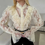 Cream sheer lace blouse with ruffled front and button-up placket
