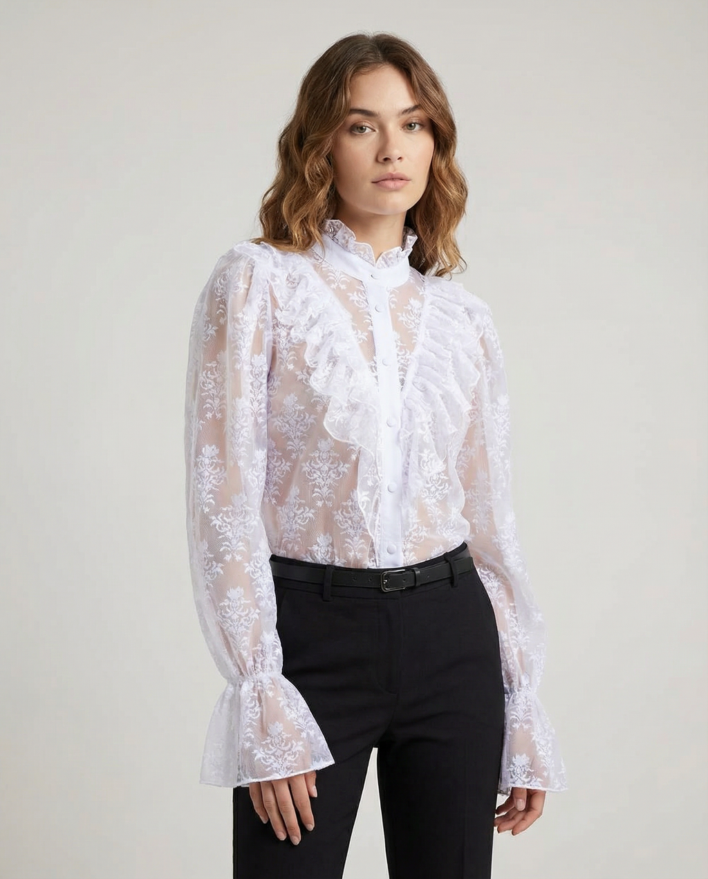White sheer lace blouse with ruffled bib front and long puff sleeves