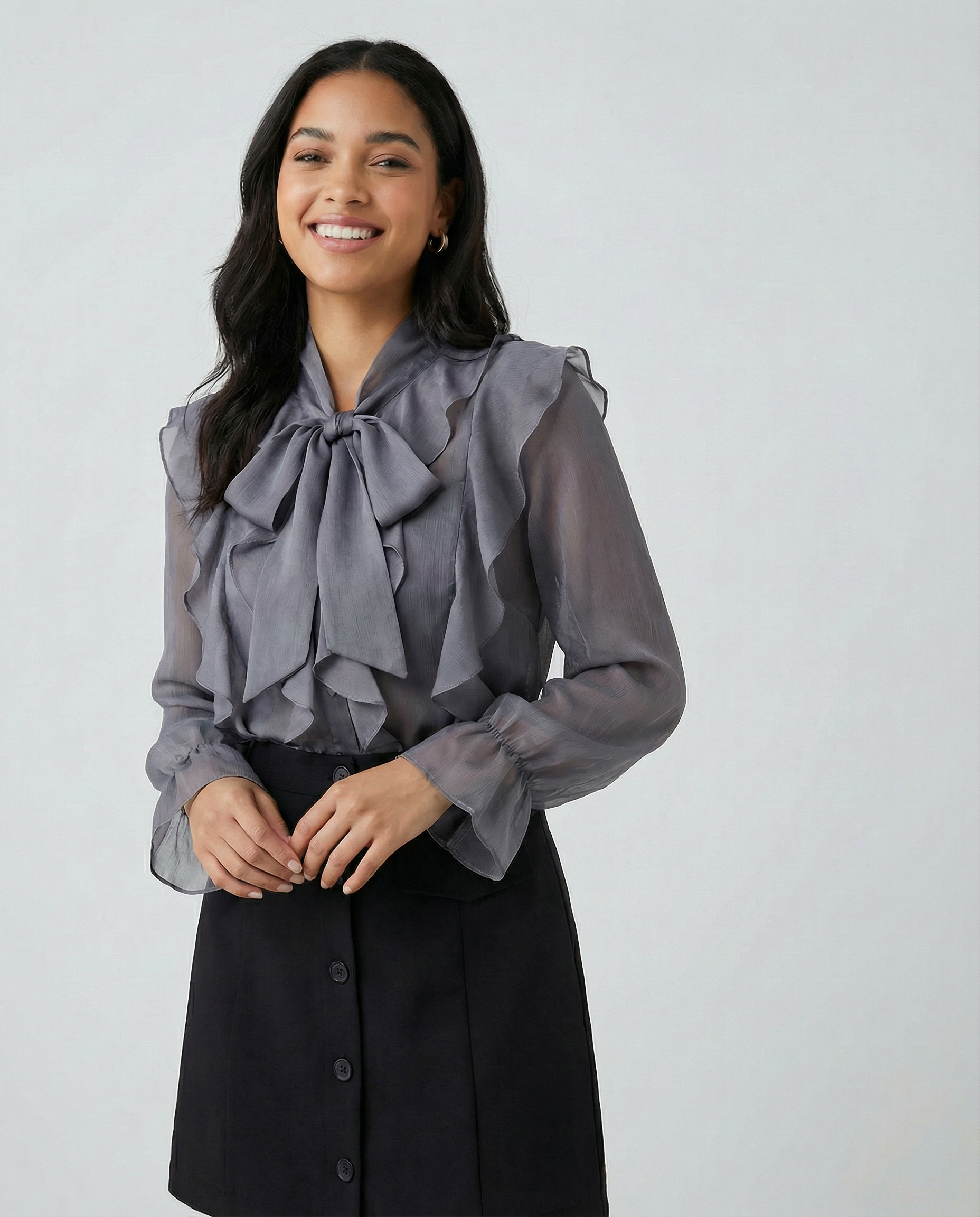 Gray chiffon blouse with large ruffled collar bow and long sheer sleeves