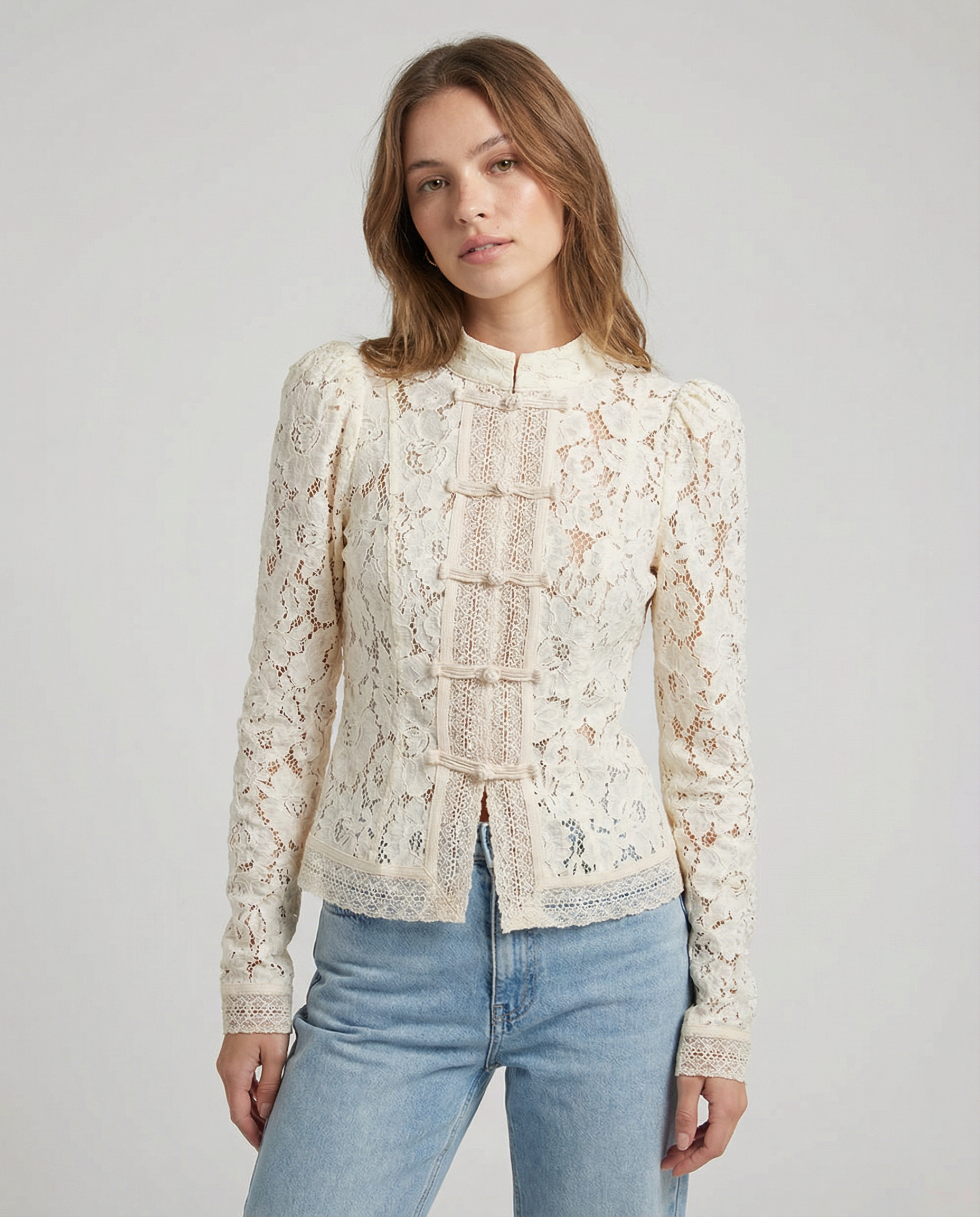 Women’s lace blouse with high neck and long sleeves, front lace panel detail, cream