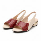 Red and white block-heel sandal with open toe and chain ankle strap
