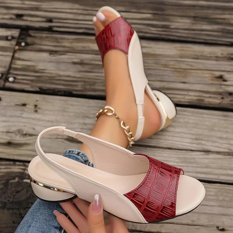 Red and white slide sandal with open toe, low block heel, chain ankle strap