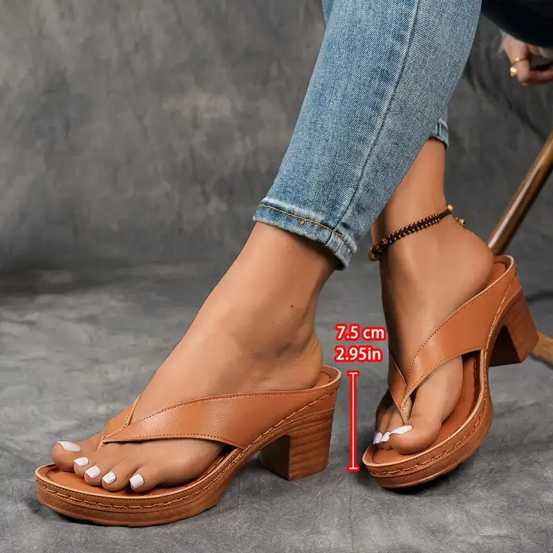 Women’s tan cushioned platform slides with cross strap and chunky block heel