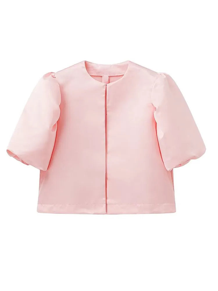 Pink puff-sleeve blouse with short sleeves and button-front placket