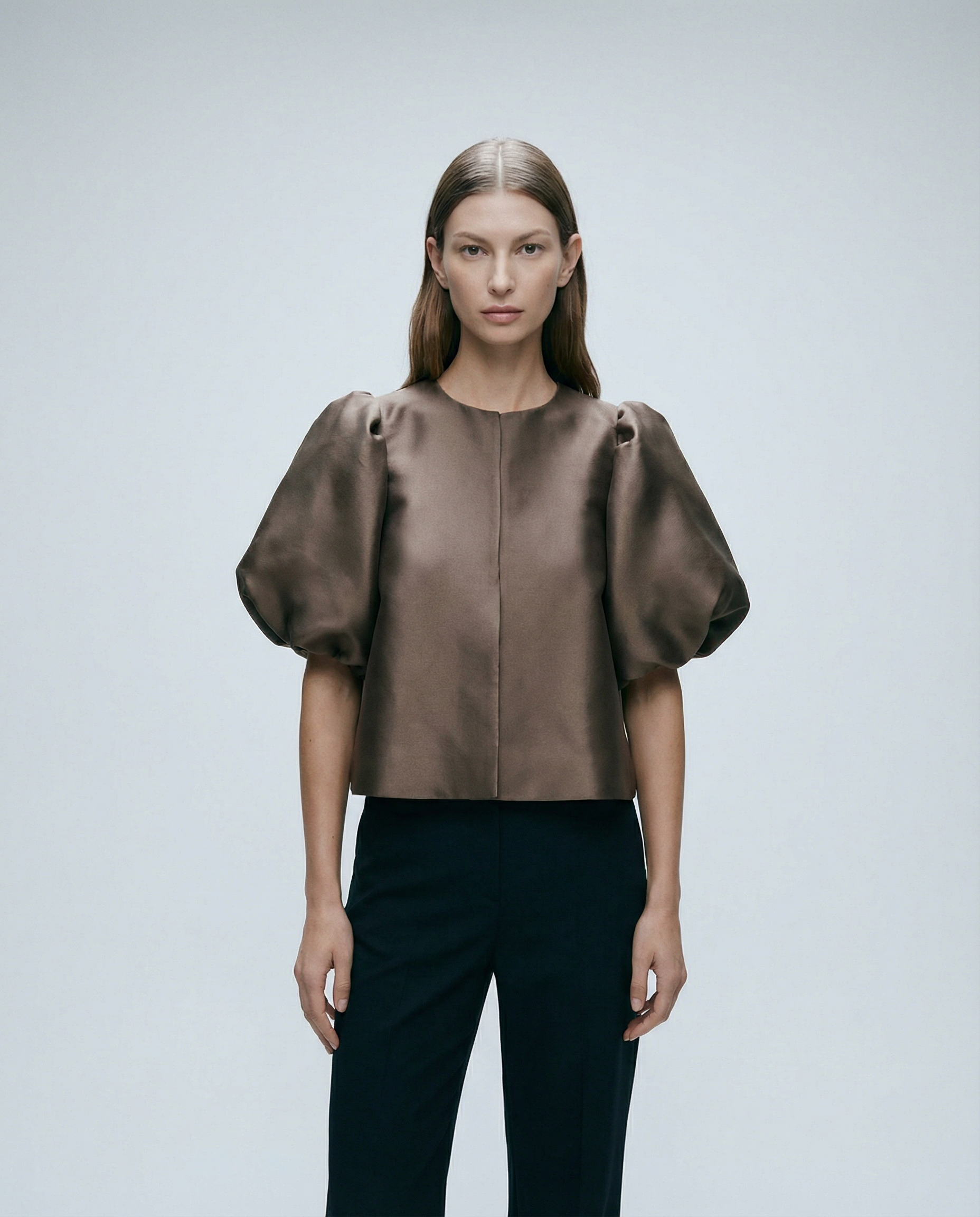 Chocolate brown satin blouse with short puff sleeves and center-front seam