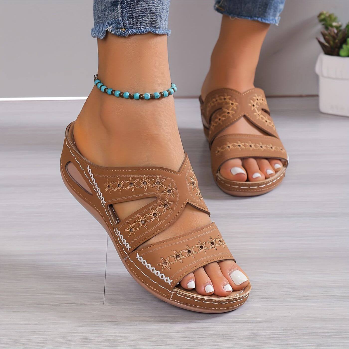 Women's tan slip-resistant sandals, open toe with two straps and decorative stitched upper