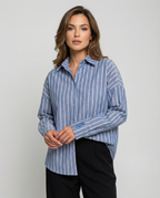 Blue striped button-down shirt with pointed collar and front button placket