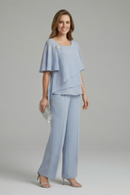 Light blue womens top and trousers set, layered top and straight wide-leg trousers, front view