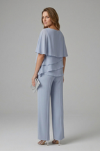 Light blue womens top and trousers set, layered top with wide straight-leg trousers, side view