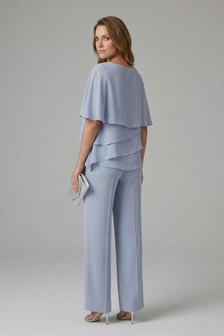 Light blue womens top and trousers set, layered top with wide straight-leg trousers, side view