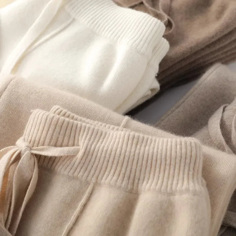 Close-up of ribbed waistband and drawstring on women’s knit lounge pants, light beige