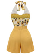 Yellow halter romper with sunflower print bodice and smocked back panel, belted waist