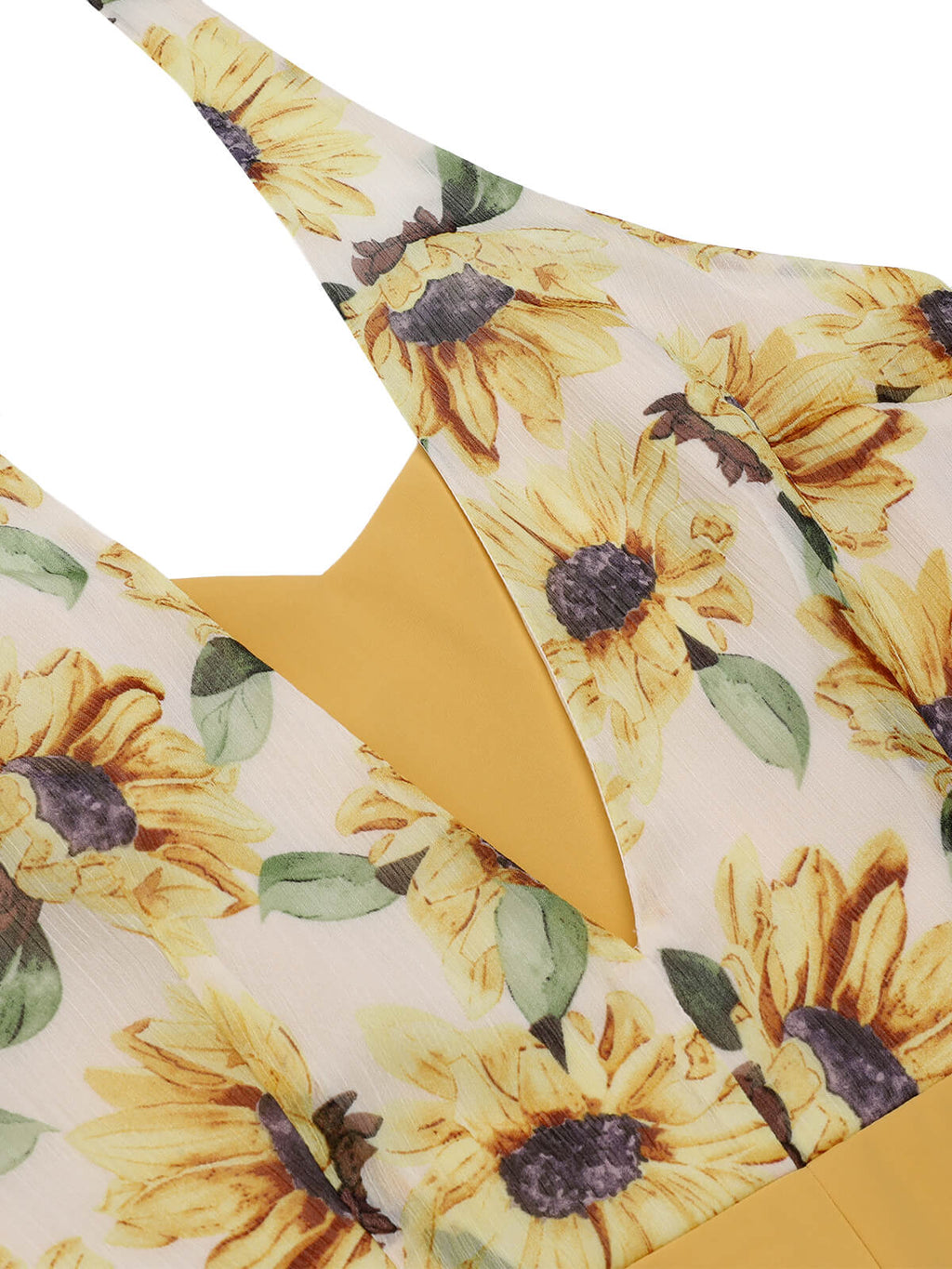 Close-up of sunflower halter neckline and yellow inner panel on the romper