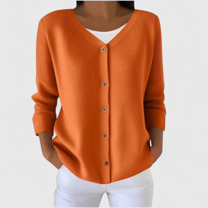 Orange knit cardigan with V-neck button front and three-quarter sleeves.