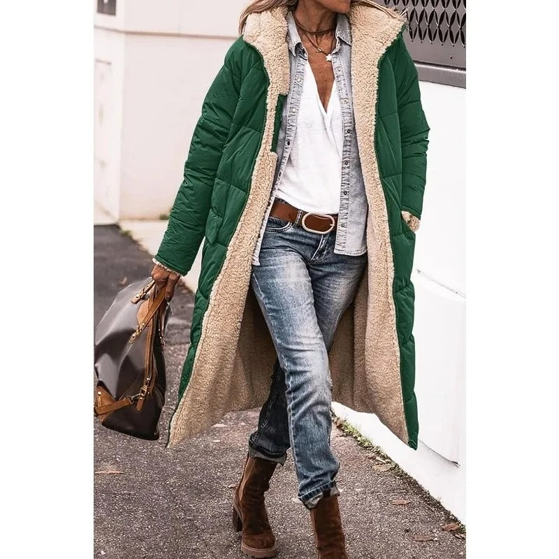 Green longline puffer jacket with sherpa-lined hood and tan faux-fur trim