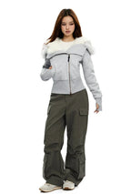Light grey zip-up hoodie with white faux fur trim on hood edges and front zipper