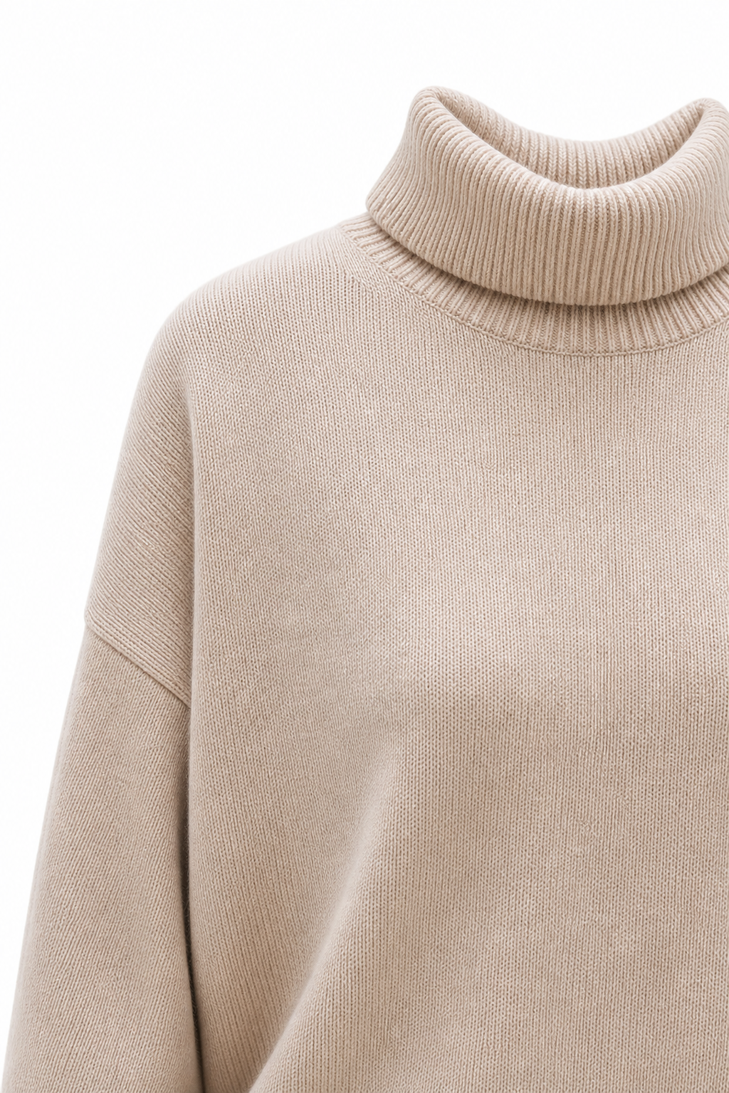 Beige merino blend turtleneck sweater close-up of knit texture and collar