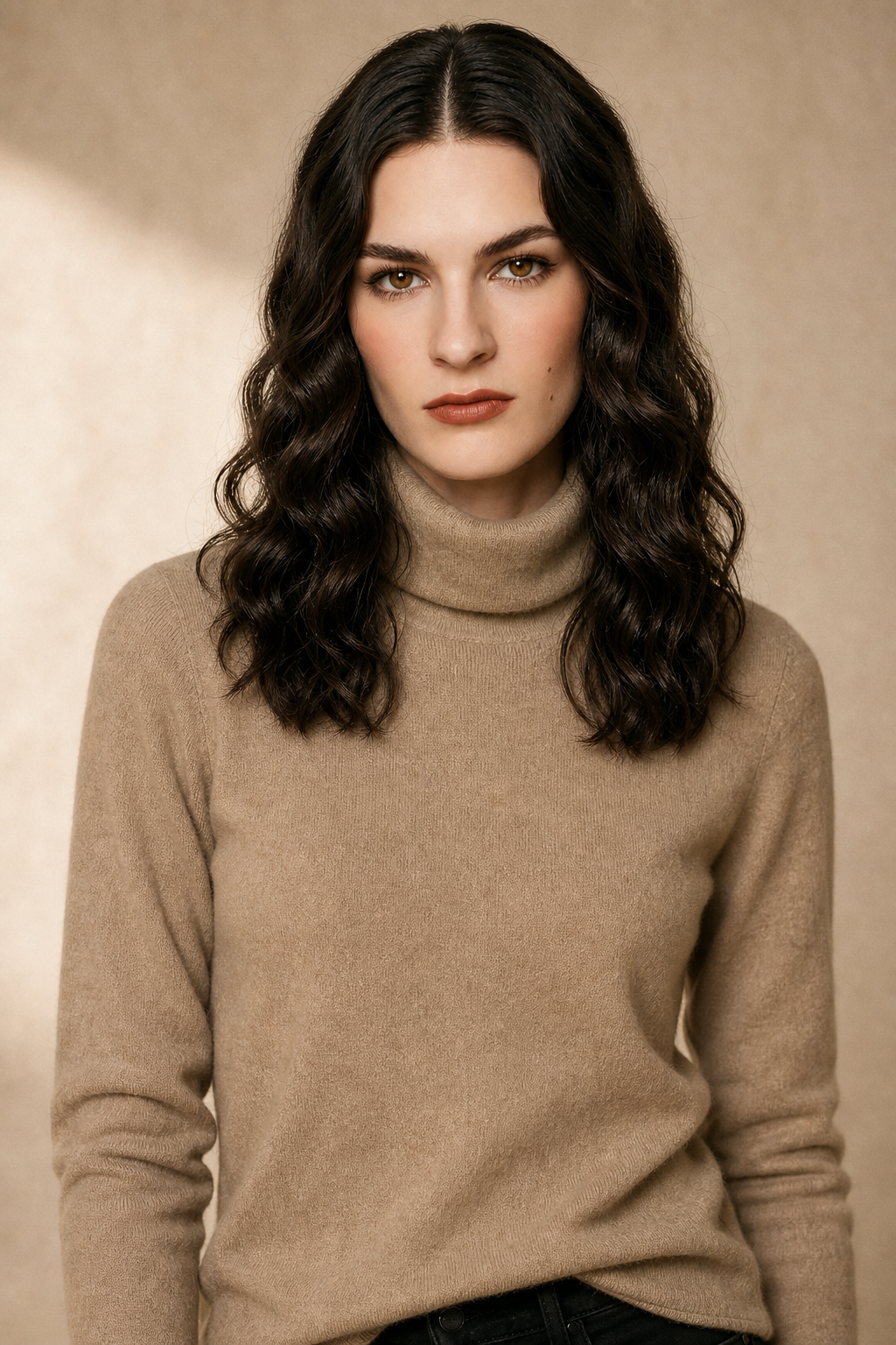 Beige women’s slim fit turtleneck knit sweater with long sleeves, worn on model.