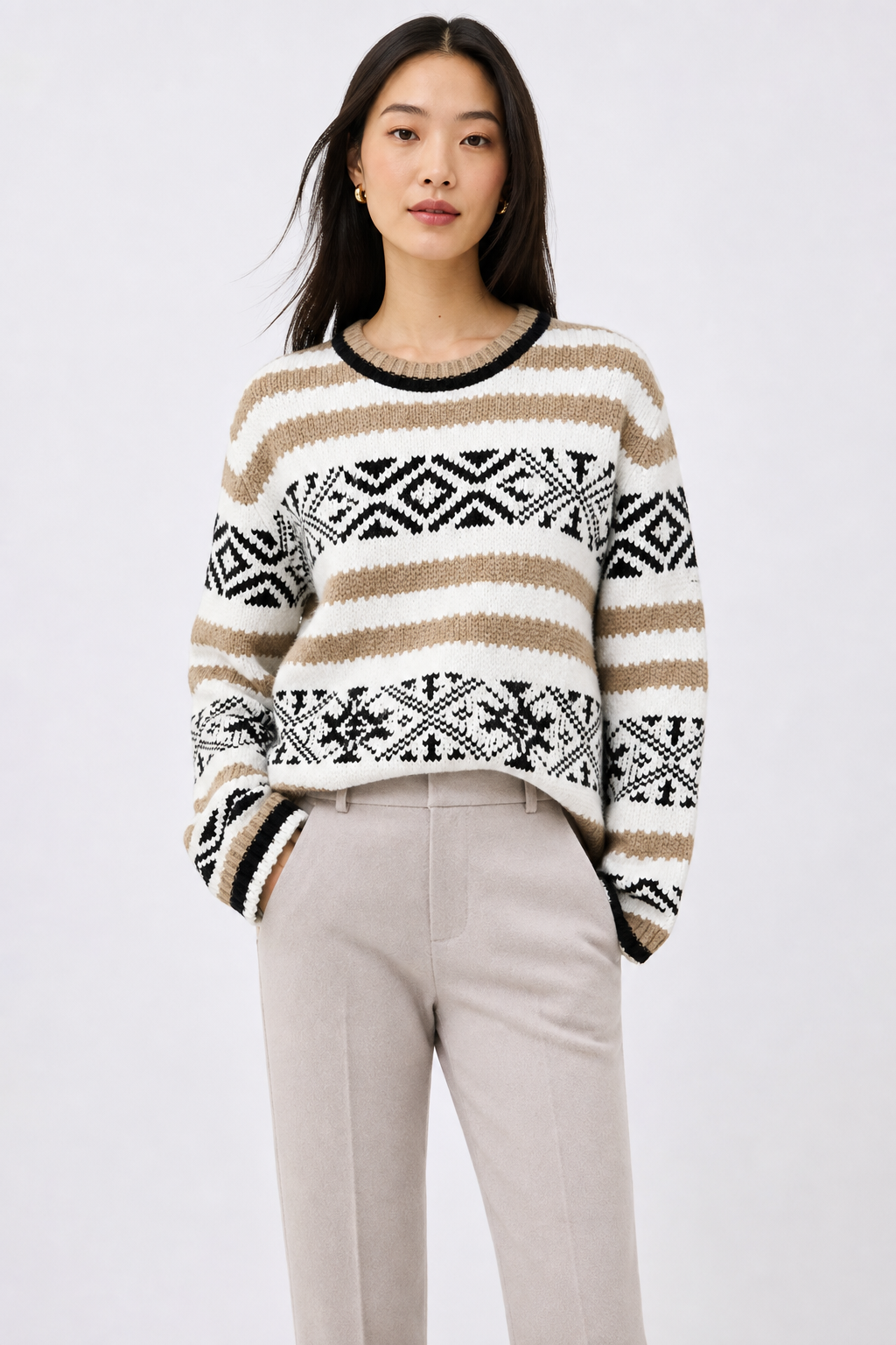 High-waisted herringbone wool-blend trousers in light gray, tailored seams and straight legs