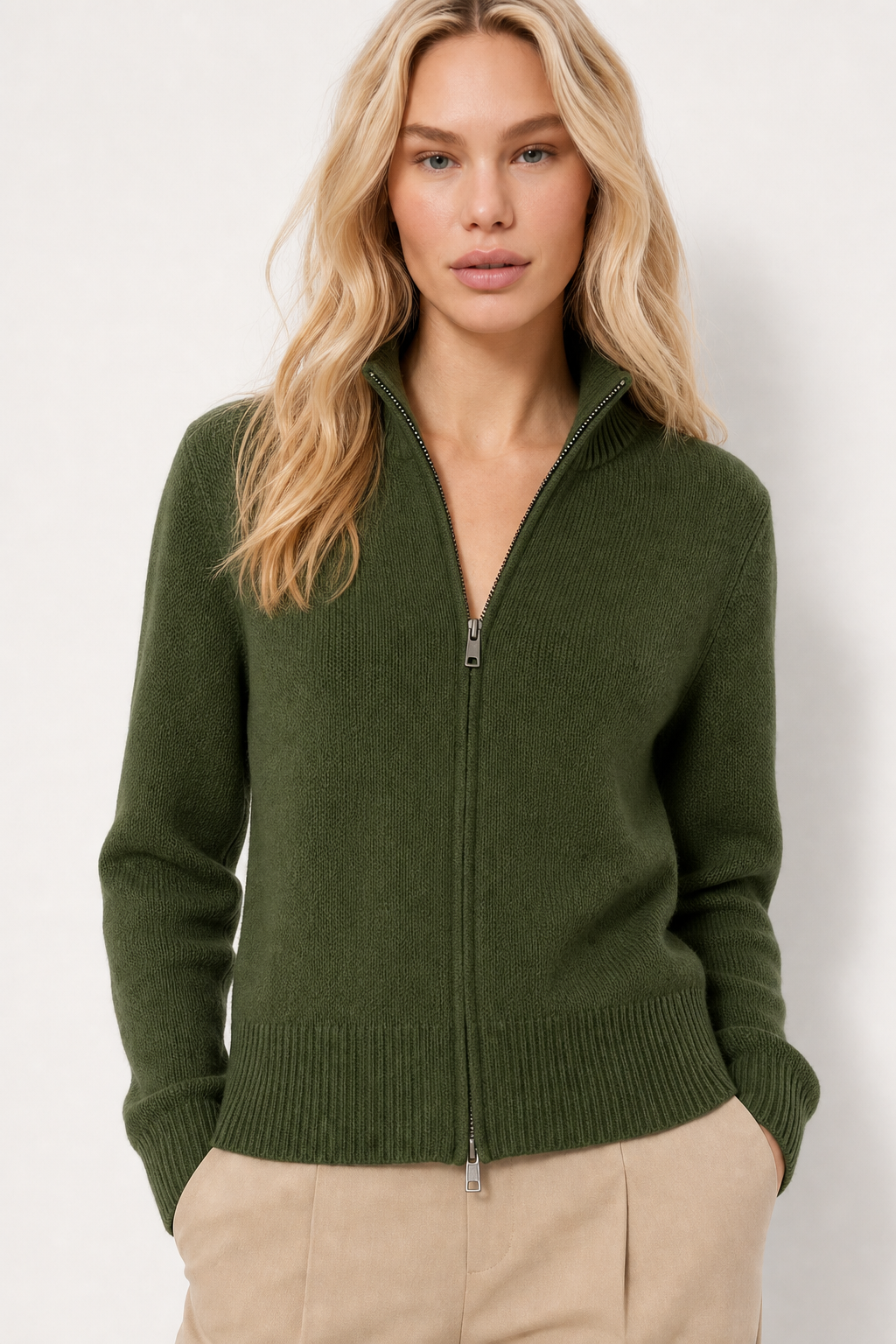 Dark green merino wool blend zip-up cardigan with ribbed hem and front zipper