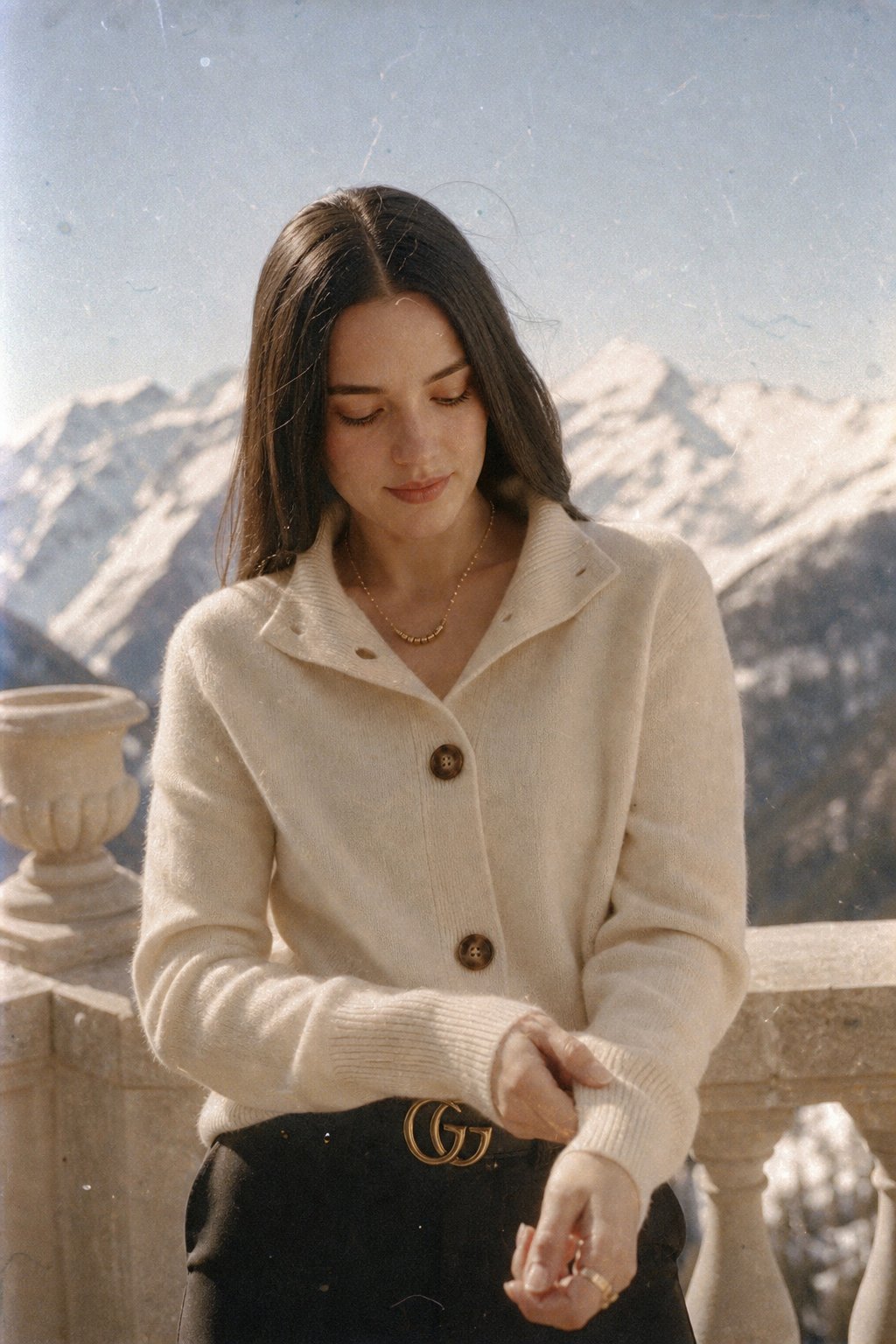 Women’s ivory button-front cardigan sweater with long sleeves and ribbed cuffs