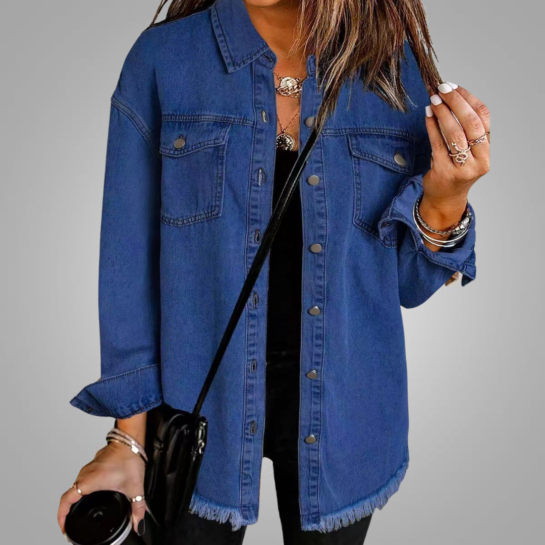 Blue denim jacket with chest pockets, button front, and frayed hem.