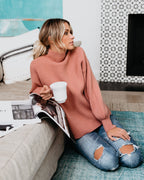 Blush-pink mock neck knit sweater, side view, long sleeves, pullover