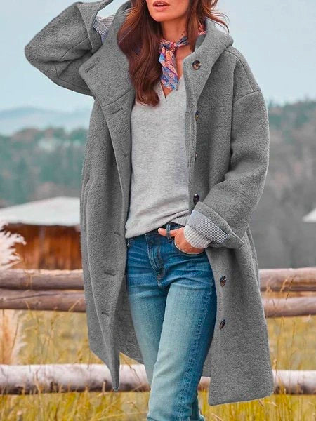 Women’s soft wool coat, grey hooded front with button closure and pockets.