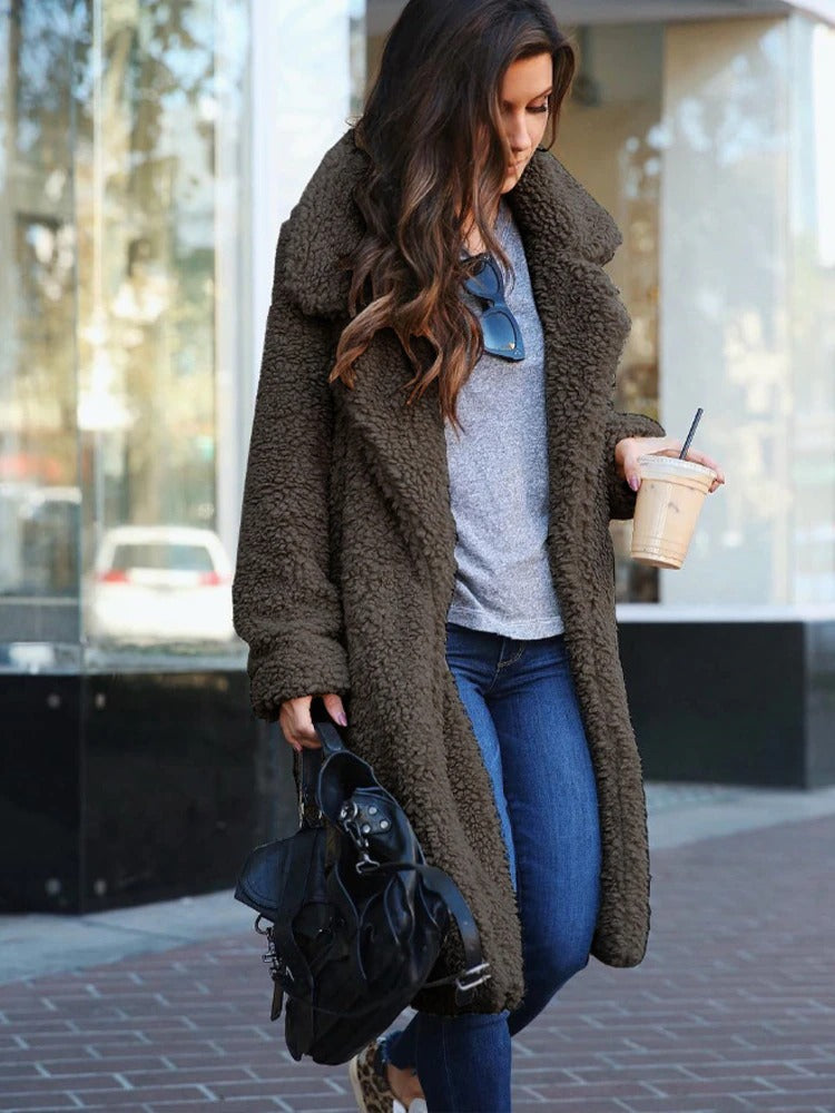 Soft long teddy fleece coat in dark gray-brown, full buttonless front with lapels.