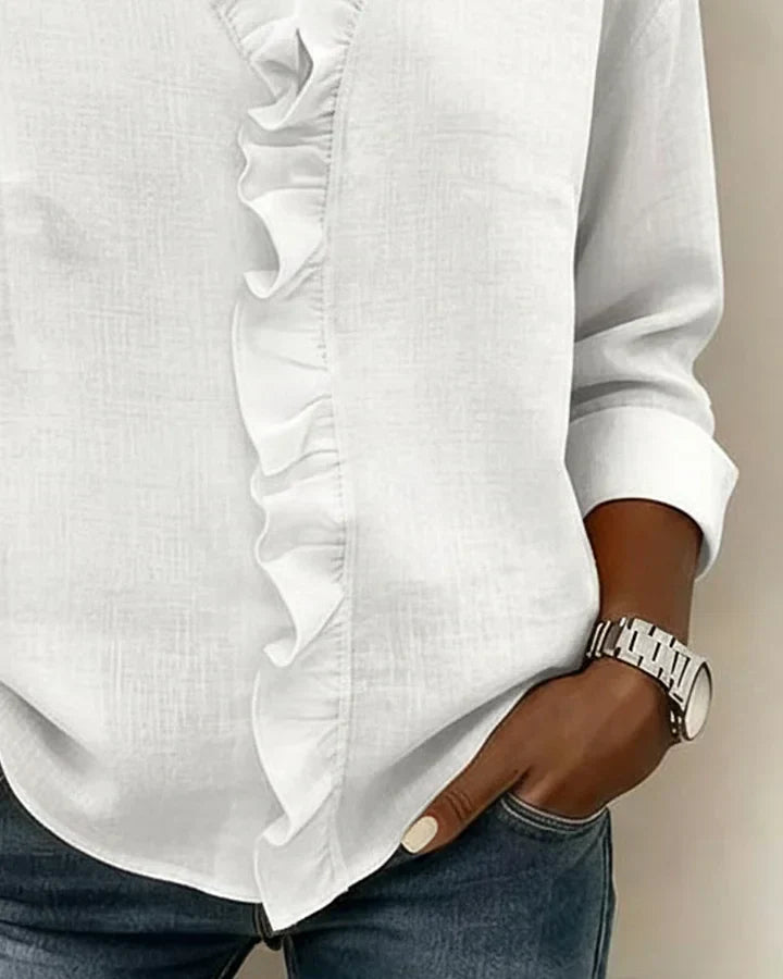 White ruffle-trim V-neck blouse with long sleeves