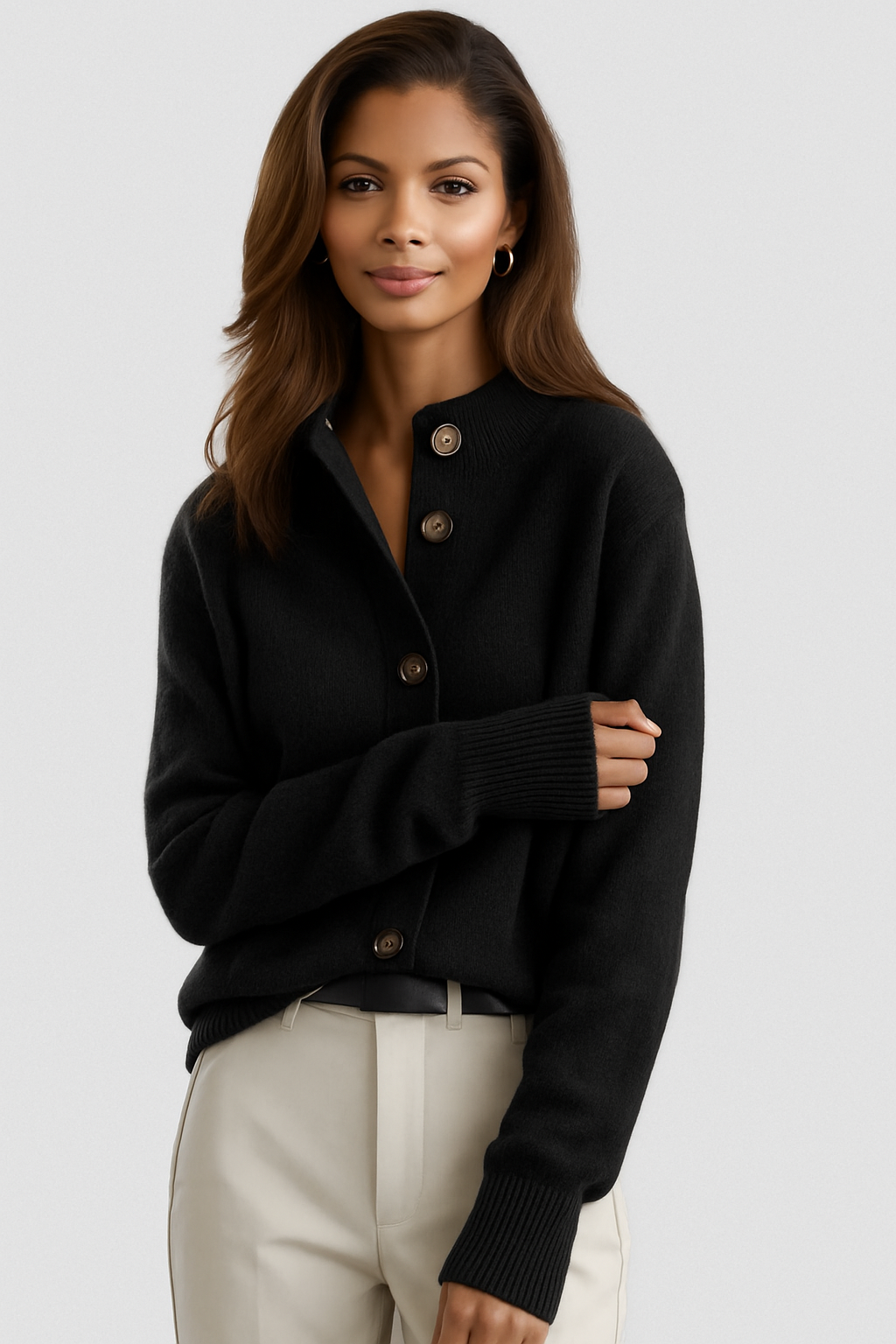 Black knit cardigan with collar, button-front placket, long sleeves, ribbed cuffs