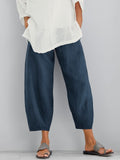 Women's loose cotton cropped pants in navy blue, wide legs and cuffed hem