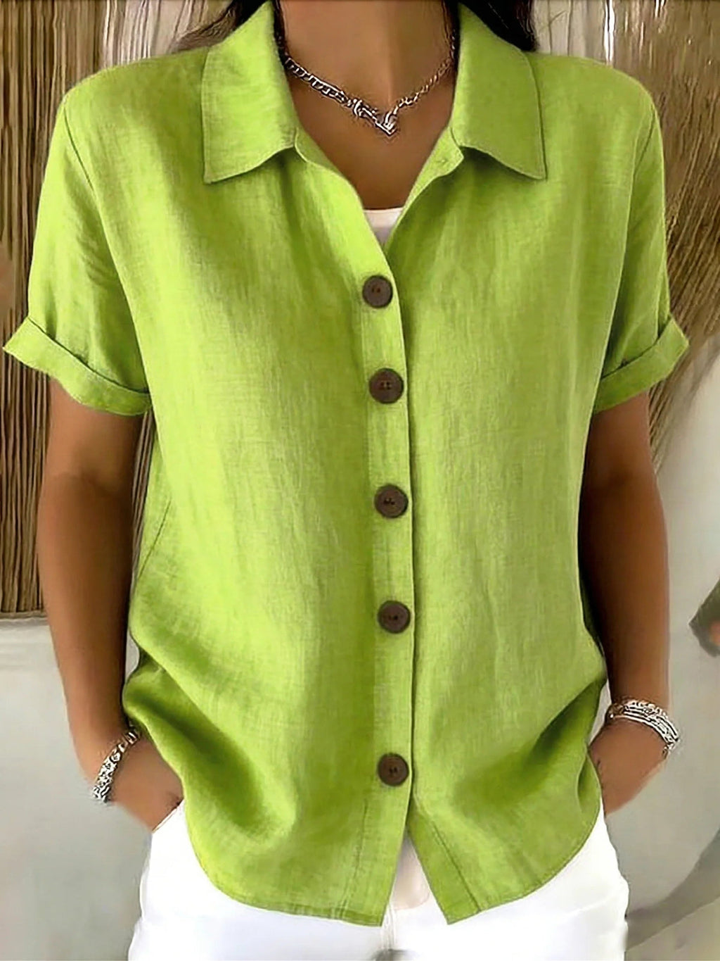 Green short-sleeve button-up linen-cotton shirt with pointed collar and front buttons